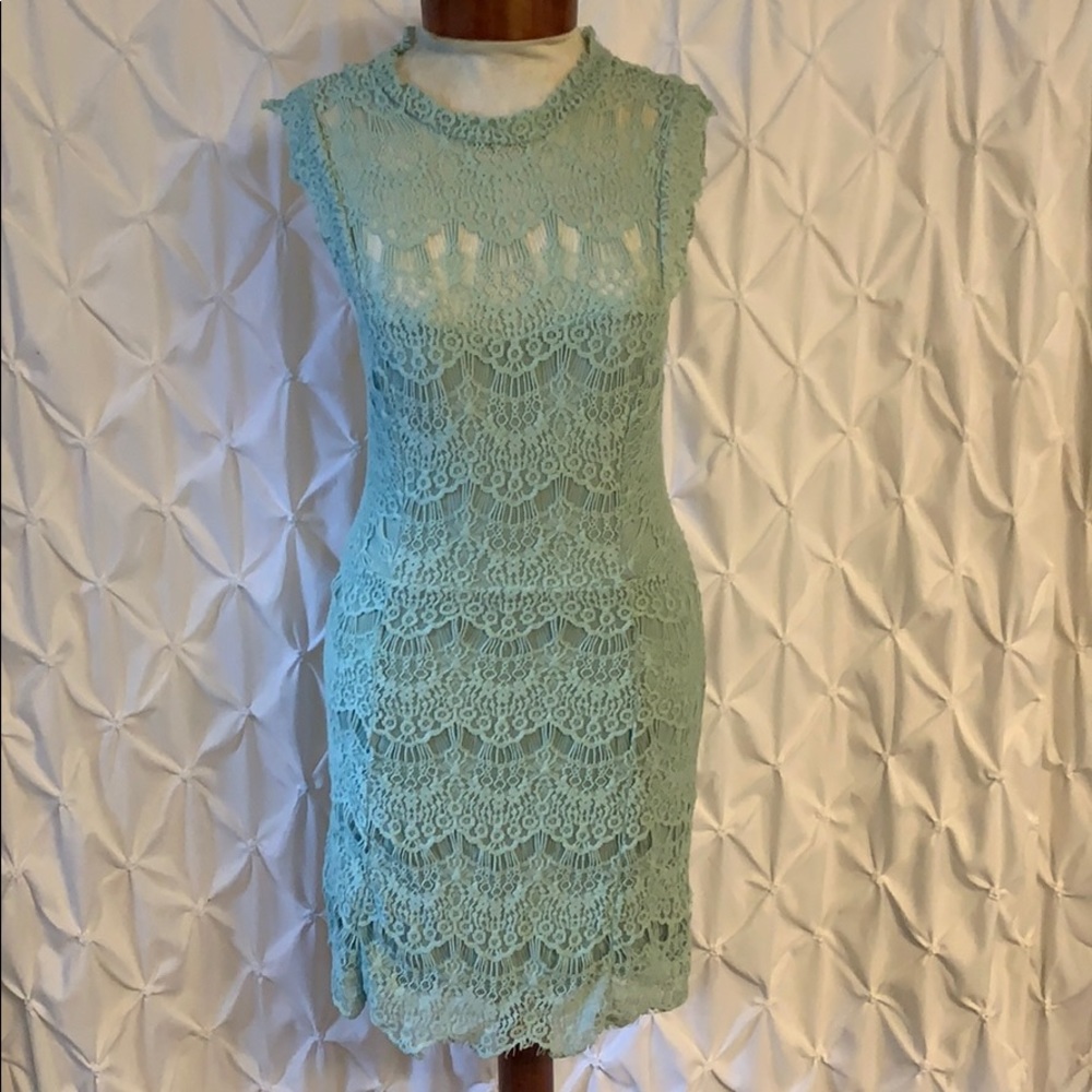 Mint dress backless and beautiful lace work.
